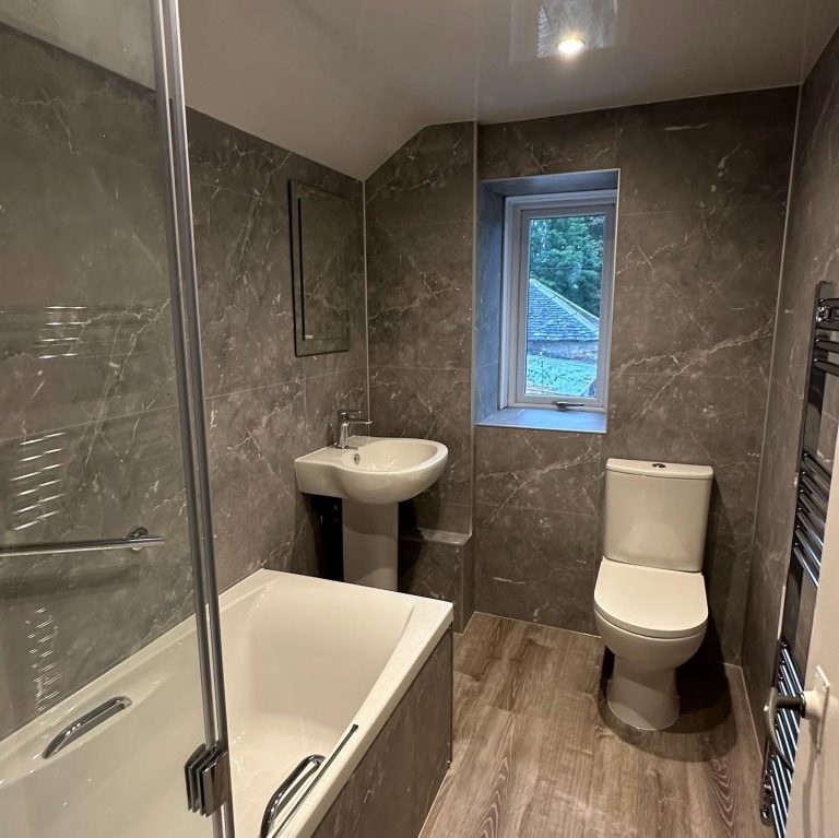 Beautiful bathroom completed with elegant finishing touches and quality details.