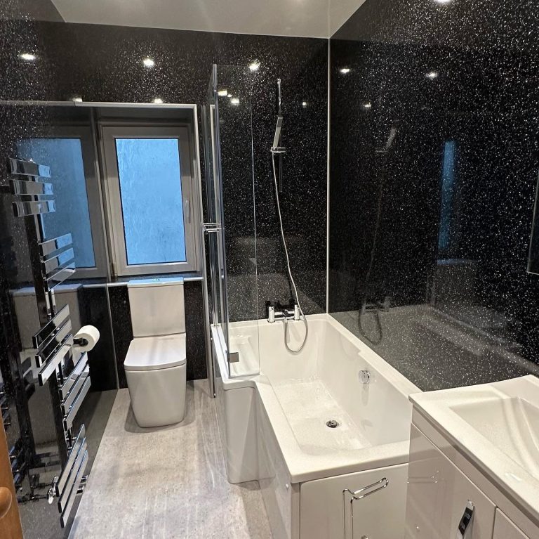 Luxury bathroom renovation featuring modern tiling and premium fittings