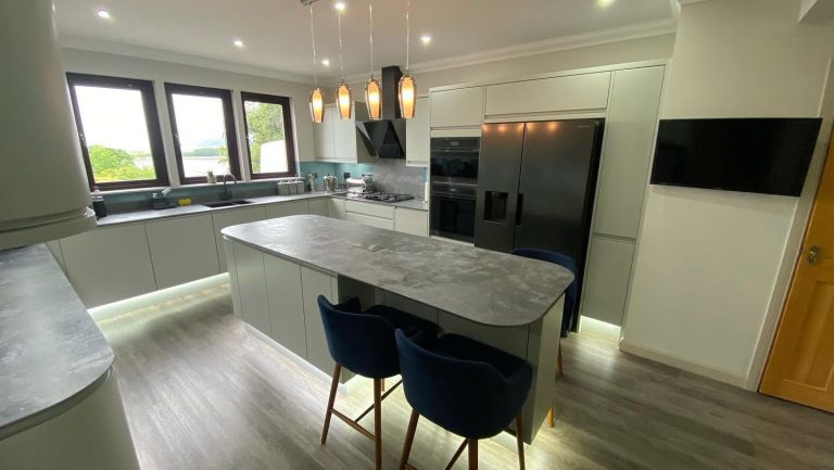 Modern kitchen featuring a spacious island and premium worktops.