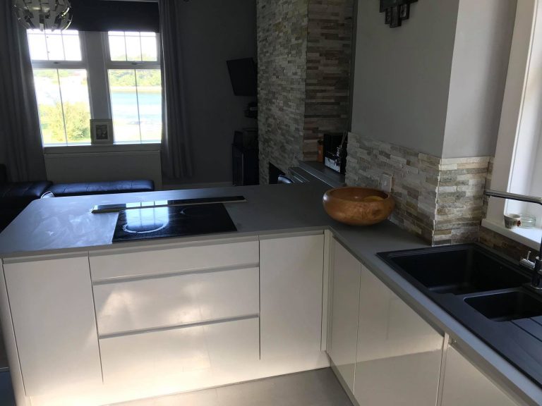 Modern sink and tap installation with sleek contemporary styling.